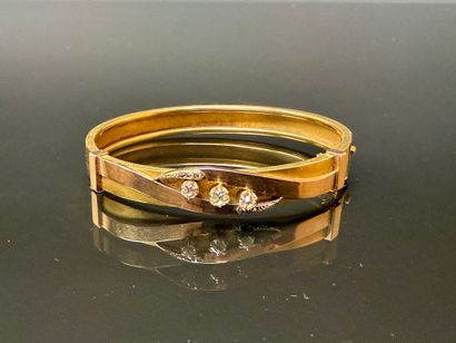 Semi-rigid gold bracelet set with three diamonds,...