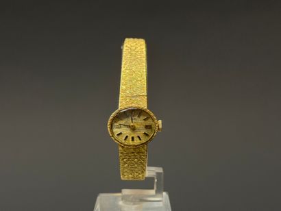 Gold ladies' watch, oval dial, gold bracelet.
750°/00...