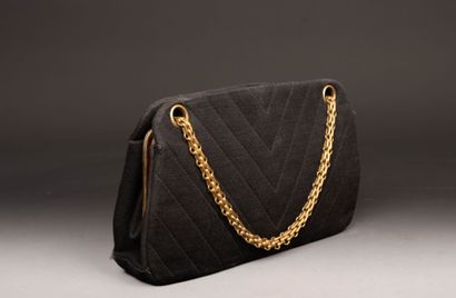 CHANEL. Evening bag in black jersey with...