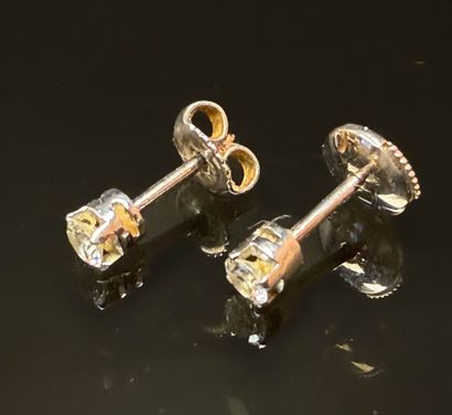 Pair of gold and diamond earrings, approx....