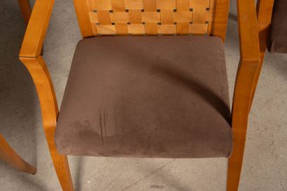 Suite of 6 armchairs in woven fruitwood veneer
Modern...
