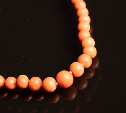 Gold and coral ring. Weight: 5.40 g, 
Necklace,...