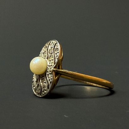 Gold ring set with a cultured pearl surrounded...