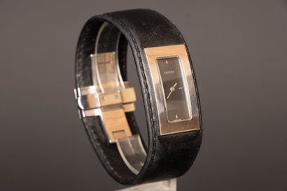 GUCCI
Black leather and steel cuff watch
Quartz...