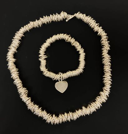 Necklace composed of a multitude of small...