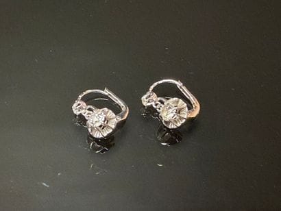 Pair of sleeper earrings in white gold set...