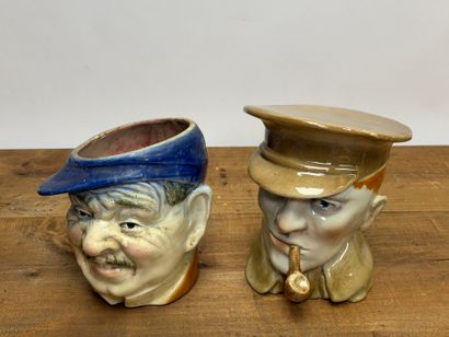 SAINT CLEMENT
Deux pots à tabac en faïence:...
