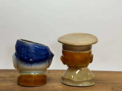 SAINT CLEMENT
Deux pots à tabac en faïence:...