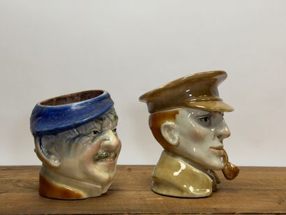 SAINT CLEMENT
Deux pots à tabac en faïence:...