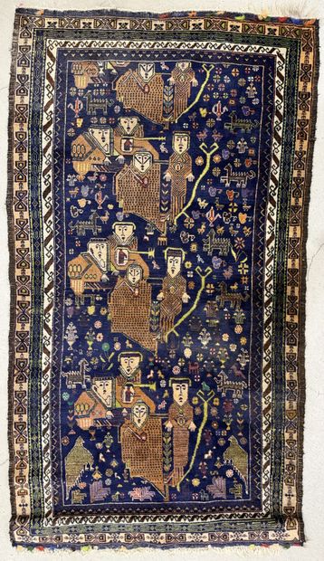 Tapis afghan en lainé à décor de personnages
200...