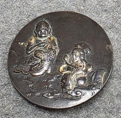 Bouton en bronze patiné japonais figurant...