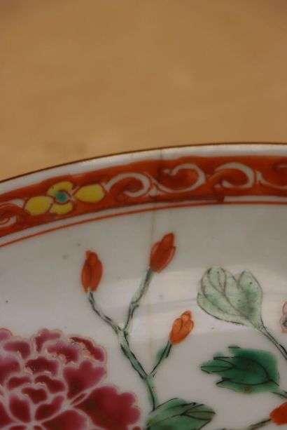 Assiette en porcelaine de Chine. 
D. :22...