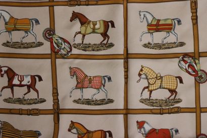 HERMES 
Carré en twill de soie à décor de...