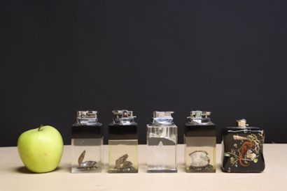 Collection de 5 briquets de table. 
H. :...