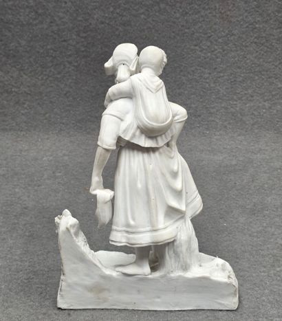 Statuette en biscuit représentant une femme...