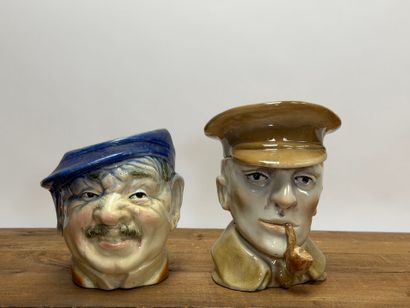 SAINT CLEMENT
Deux pots à tabac en faïence:...