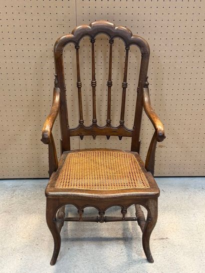 Fauteuil americain, assise cannée. 
Début...