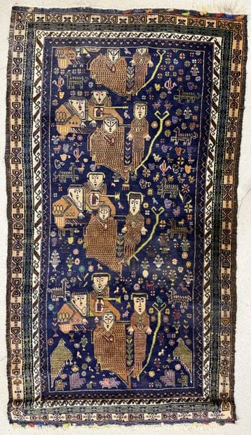 Tapis afghan en lainé à décor de personnages
200...