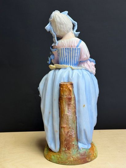 Jeune fille. 
Sculpture en résine. 
H. :42...