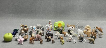Collection d'éléphants en pierre, verre,...