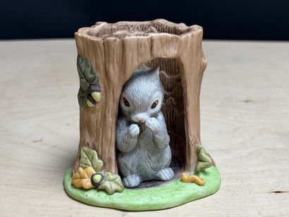 FRANKLIN Neuf statuettes animalieres en porcelaine....