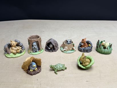 FRANKLIN Neuf statuettes animalieres en porcelaine....