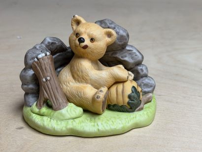 FRANKLIN Neuf statuettes animalieres en porcelaine....