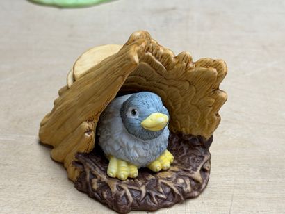 FRANKLIN Neuf statuettes animalieres en porcelaine....
