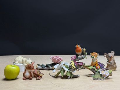 Huit sujets animaliers en biscuit
H. :de...