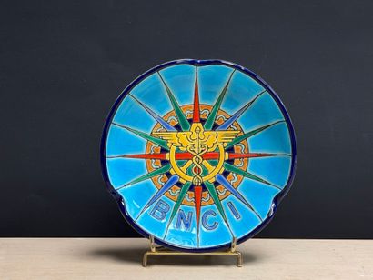 LONGWY. 
Cendrier en faience BNCI 
D. :13,5...