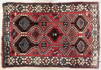 Tapis laine tissé main, marron et rouge
155...