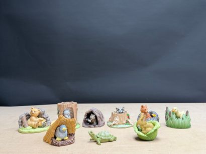 FRANKLIN Neuf statuettes animalieres en porcelaine....