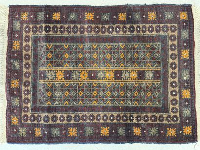 Tapis laine tissé main, marron et orange.
Afghanistan...