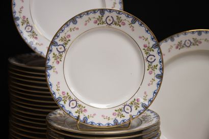Limoges porcelain dinner service with a floral...