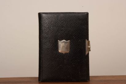 A collection of photographs, including six...