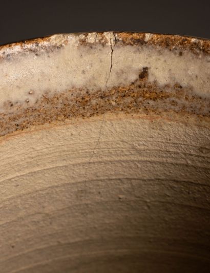 Stoneware vase with three asymmetrical side...