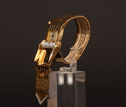 Gold wristwatch featuring a belt motif, accented...