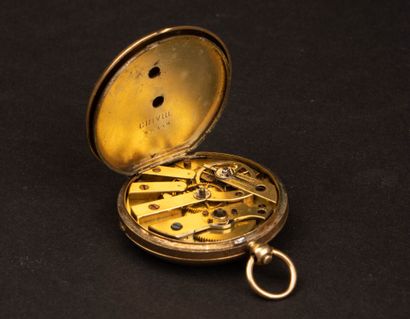 Gold pocket watch with a gold-plated metal...