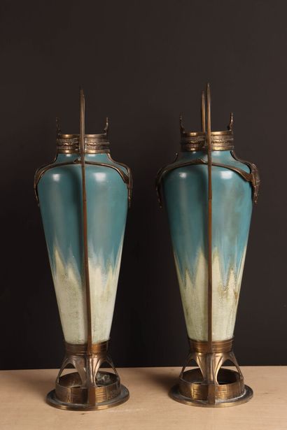 Pair of ceramic vases with nuanced blue enamel...