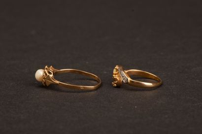 Two antique gold rings; one stone is missing,...
