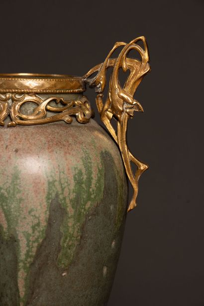 Glazed stoneware vase in shades of green...