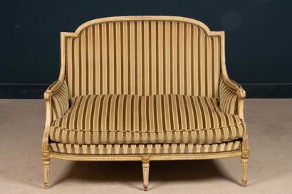Pair of carved wooden sofas, upholstered...
