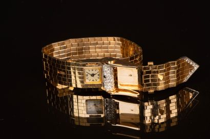 Gold wristwatch featuring a belt motif, accented...