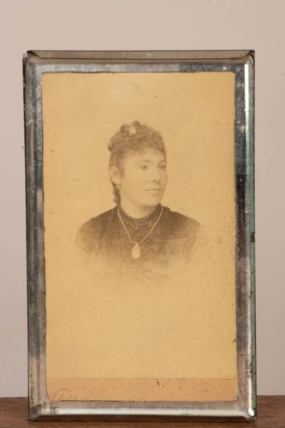 A collection of photographs, including six...