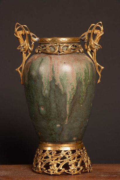 Glazed stoneware vase in shades of green...