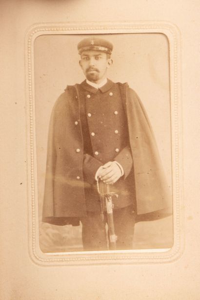 A collection of photographs, including six...