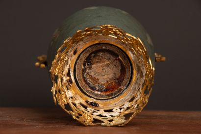 Glazed stoneware vase in shades of green...