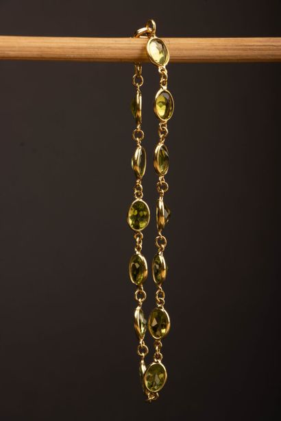 Gold and Peridot Bracelet
750°/00 Gold
L:...