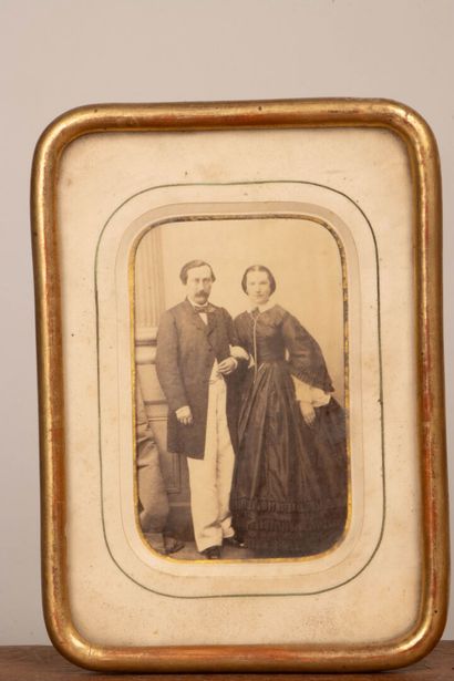 A collection of photographs, including six...