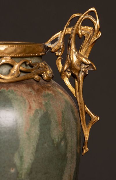 Glazed stoneware vase in shades of green...